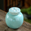 Ceramic Pet Memorial Urn Collection with Paw Print